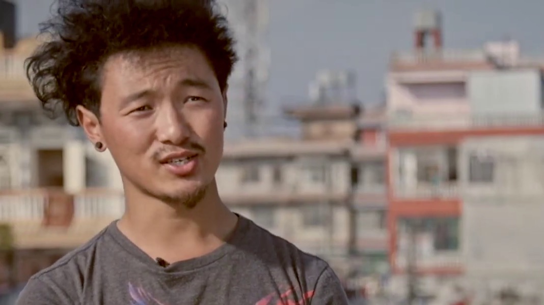 A young man giving an interview in Nepal.